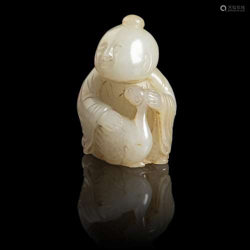 PALE CELADON WITH YELLOW SKIN JADE CARVING OF A BOY AND GOOSE QING DYNASTY, 18TH CENTURY