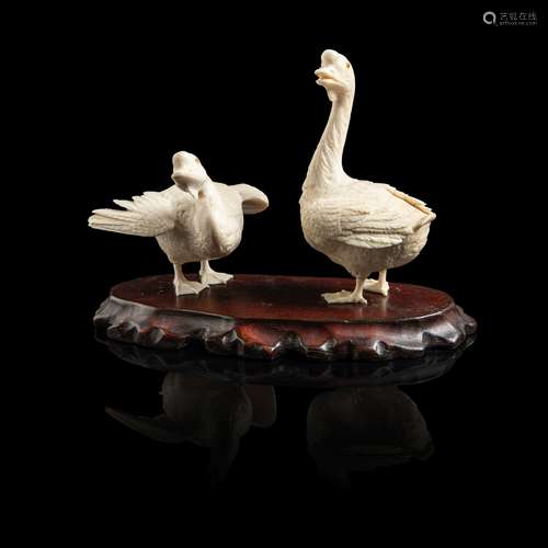 Y PAIR OF IVORY OKIMONO GEESE MEIJI PERIOD