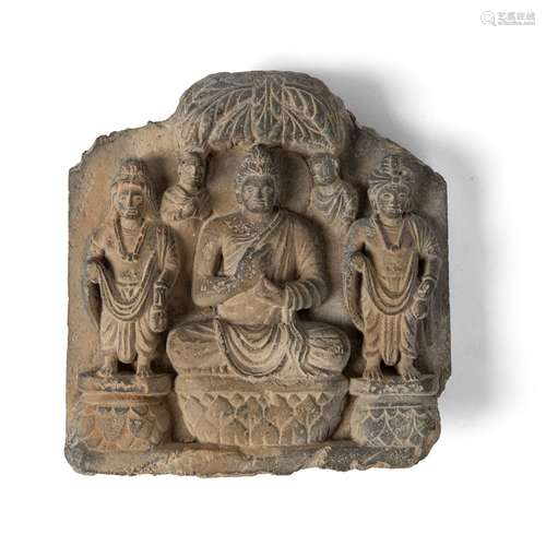 SCHIST PANEL WITH SEATED BUDDHA FLANKED BY ATTENDANTS GANDHARA, 2ND-3RD CENTURY AD