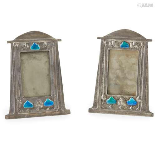 ATTRIBUTED TO LIBERTY & CO., LONDON PAIR OF ARTS & CRAFTS PEWTER AND ENAMEL PHOTOGRAPH FRAMES,