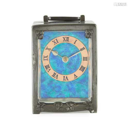 ARCHIBALD KNOX (1864-1933) FOR LIBERTY & CO., LONDON 'TUDRIC' PEWTER AND ENAMEL CARRIAGE CLOCK,