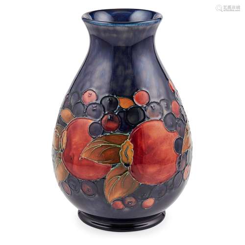 WILLIAM MOORCROFT (1872-1945) FOR MOORCROFT POTTERY 'POMEGRANATE' BALUSTER VASE, LATE 1930S