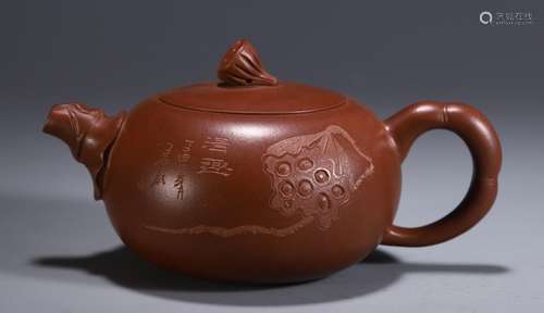 A Chinese Zisha Teapot with Loutus Seed Pattern