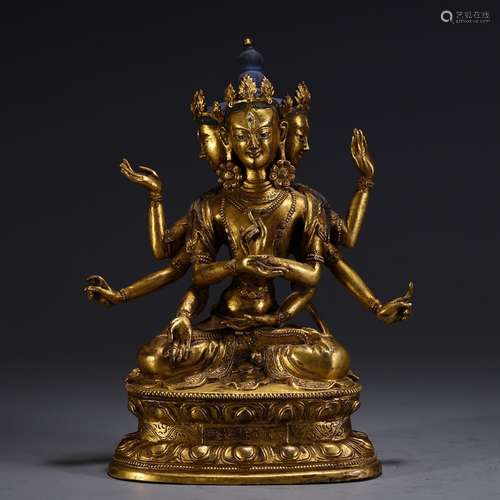 A Chinese Gilt Bronze Eight Arms Buddhisattva Statue