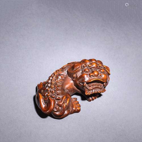 A Chinese Boxwood Carved Beast Ornament