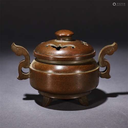 A Chinese Red Copper Piercing Incense Burner