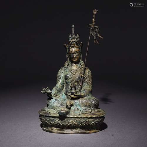 A Chinese Bronze Statue of Medicine Buddha