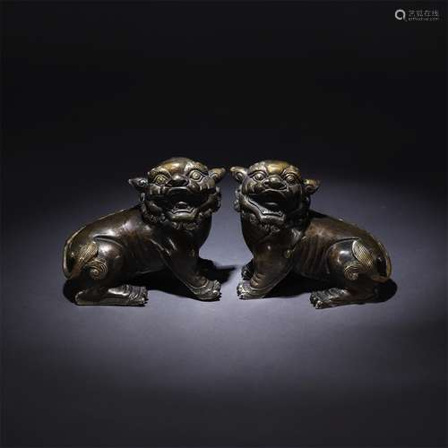 A Pair of Chinese Copper Lion Ornaments