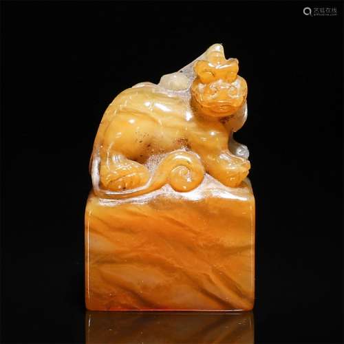 A Chinese Shoushan Yellow Agalmatolite Carved Beast Handle Seal