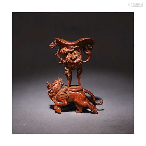 A Chinese Beast and Chi Dragon Carved Boxwood Cup