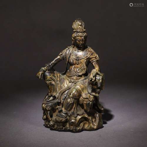 A Chinese Bronze Guanyin Statue