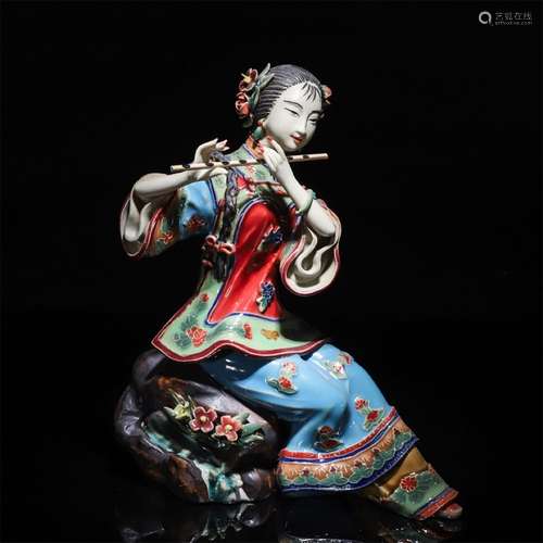 A Chinese Shiwan Kiln Porcelain Beauty Statue