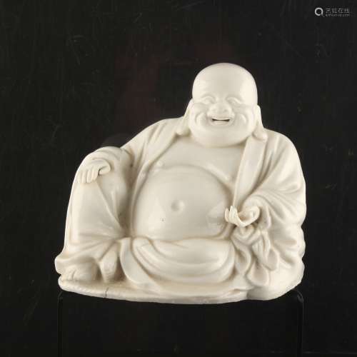 Property of a gentleman - a Chinese blanc de Chine figure of Buddha or Budai, 18th century, modelled
