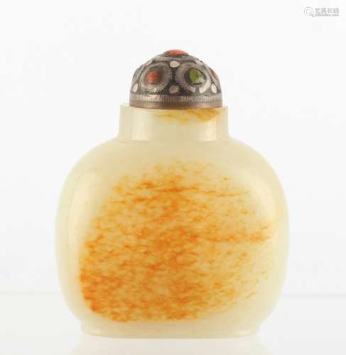 Property of a lady - a Chinese pale celadon jade snuff bottle of flattened ovoid form with