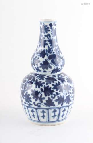 Property of a gentleman - a Chinese blue & white double gourd vase, 19th century, painted with