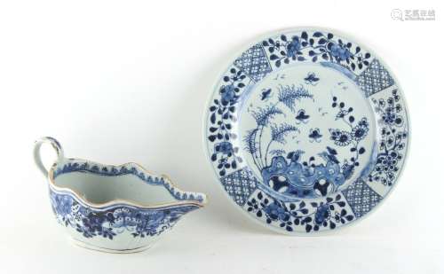 Property of a gentleman - an 18th century Chinese blue & white plate, 9ins. (23cms.) diameter;