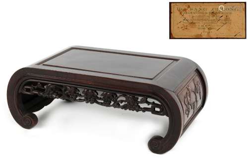 Property of a gentleman - an early 20th century Chinese carved blackwood kang table, the underside