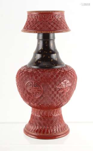 An unusual Chinese porcelain vase imitating cinnabar lacquer, Qianlong 4-character mark to underside