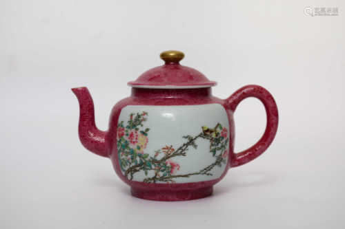 Teapot decorated with pastel windows and dark carved flowers and birds