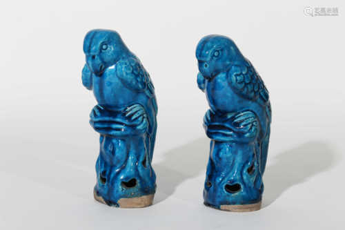 Blue glazed porcelain makes a pair of eagles