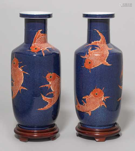 pair of blue glazed jars with red fish pattern