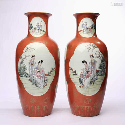 A pair of Guanyin bottles with coral red glaze and famille rose