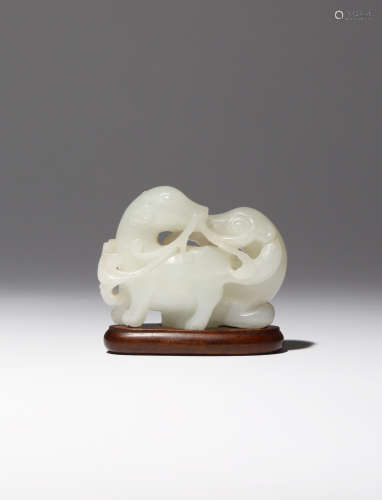 A CHINESE WHITE JADE CARVING OF TWO BADGERS QIANLONG 1736-95 One of the creatures depicted standing,