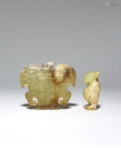 TWO CHINESE ARCHAISTIC YELLOW JADE 'BIRD' PENDANTS PROBABLY QING DYNASTY One carved as an owl