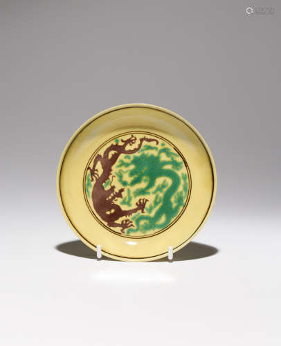 A CHINESE IMPERIAL YELLOW-GROUND 'DRAGON' SAUCER DISH SIX CHARACTER KANGXI MARK AND OF THE PERIOD