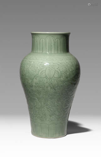 A CHINESE CELADON GLAZED VASE 18TH/19TH CENTURY The ovoid body tapering towards the foot and