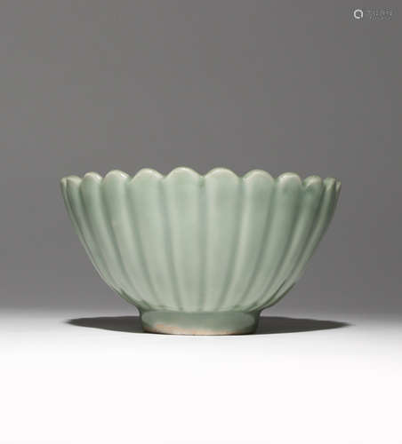 A GOOD CHINESE LONGQUAN CELADON 'CHRYSANTHEMUM' BOWL MING DYNASTY The deep fluted sides moulded as