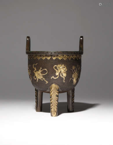 A CHINESE PARCEL-GILT BRONZE 'ANBAXIAN' TRIPOD INCENSE BURNER, DING 17TH/18TH CENTURY Cast in relief