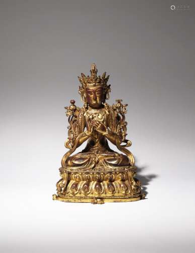 A LARGE CHINESE GILT-LACQUERED BRONZE FIGURE OF MANJUSRI QING DYNASTY Cast seated in dhyanasana upon