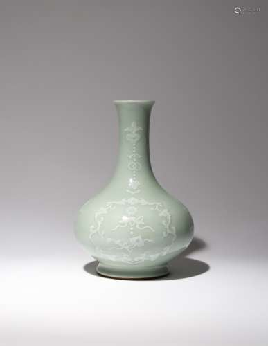 A CHINESE CELADON GLAZED SLIP-DECORATED BOTTLE VASE, BIQIPING SIX CHARACTER QIANLONG MARK AND OF THE