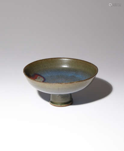 A CHINESE JUN YAO STEM BOWL YUAN/MING DYNASTY The shallow bowl raised upon a flaring foot, decorated