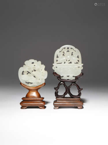 TWO CHINESE WHITE JADE OPENWORK PENDANTS QING DYNASTY One formed as a basket containing a large