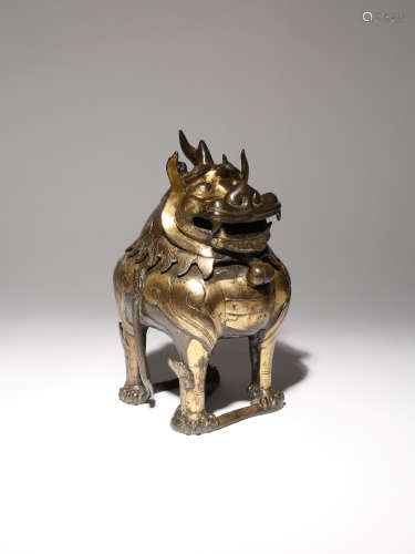 A CHINESE PARCEL-GILT BRONZE 'LUDUAN' INCENSE BURNER AND COVER 17TH CENTURY Formed as a luduan