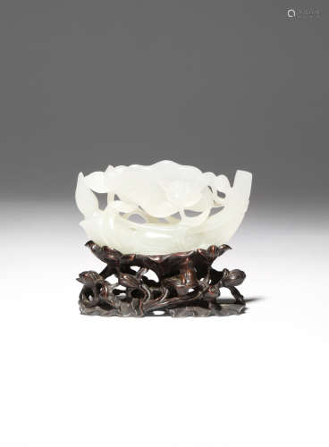 A CHINESE WHITE JADE 'LOTUS' CARVING 18TH CENTURY Carved in openwork as two lotus blooms and large