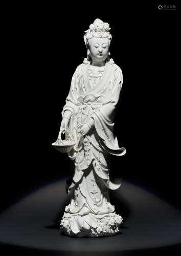 A LARGE CHINESE BLANC DE CHINE FIGURE OF GUANYIN 18TH CENTURY The bodhisattva depicted standing tall