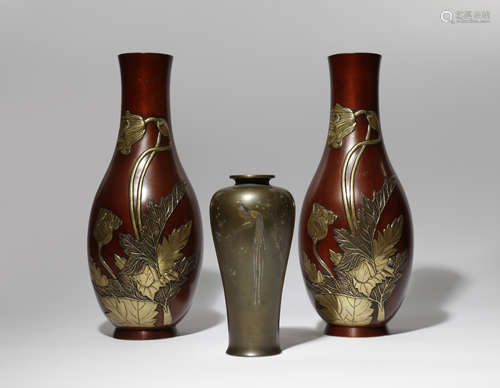 THREE JAPANESE BRONZE VASES MEIJI OR TAISHO PERIOD, 19TH OR 20TH CENTURY Two a pair with tall pear-