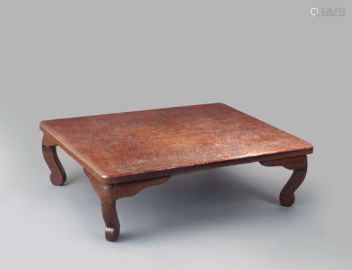 A JAPANESE RED LACQUER AND MOTHER OF PEARL LOW TABLE TAISHO PERIOD, 20TH CENTURY The rectangular top