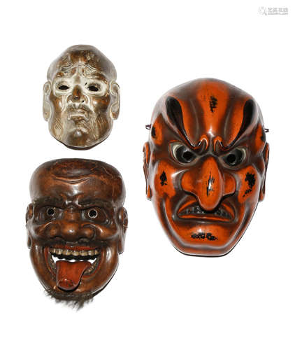 THREE JAPANESE LACQUERED MASKS MEIJI PERIOD, 19TH AND 20TH CENTURY The largest in red and black