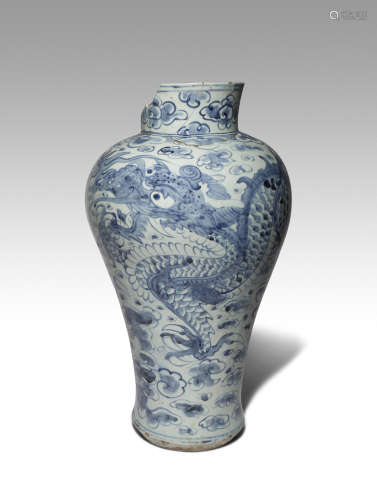 A LARGE KOREAN BLUE AND WHITE DRAGON VASE JOSEON DYNASTY, 19TH CENTURY The tall baluster-shaped body
