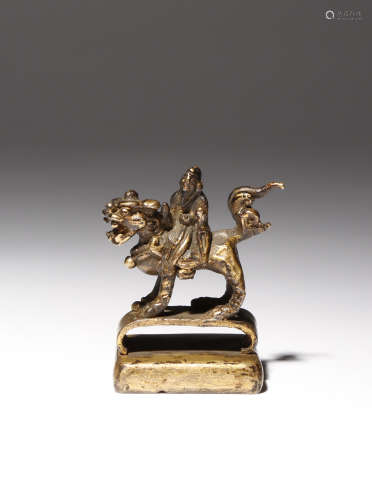 A SMALL GILT-BRONZE SEAL, POSSIBLY KOREAN POSSIBLY JOSEON DYNASTY Cast as an Immortal riding a