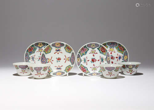 A SET OF FOUR CHINESE FAMILLE ROSE TEA BOWLS AND SAUCERS QIANLONG 1736-95 Each brightly painted in