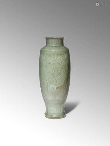 A CHINESE LONGQUAN CELADON VASE MING DYNASTY The tall ovoid body supported on a gently spreading