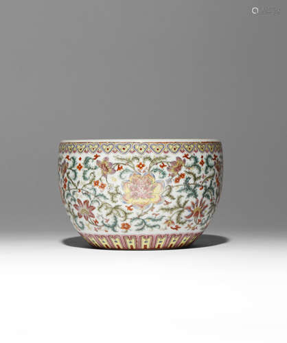 A CHINESE FAMILLE ROSE 'LOTUS' BOWL 20TH CENTURY Painted with four large lotus flowerheads set