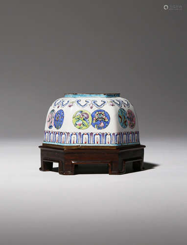 A CHINESE FAMILLE ROSE CANTON ENAMEL HEXAGONAL-SECTION WATERPOT 18TH CENTURY Each facet decorated