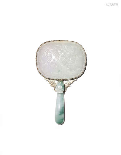 A CHINESE JADEITE BELTHOOK AND PLAQUE MOUNTED AS A HAND HELD MIRROR 19TH/EARLY 20TH CENTURY The