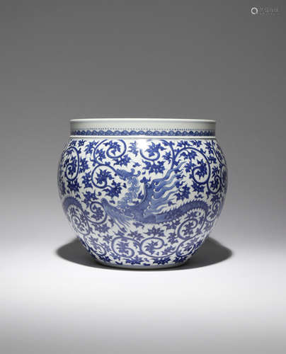 A CHINESE BLUE AND WHITE 'PHOENIX' JARDINIERE 20TH CENTURY Painted with four stylised phoenix in